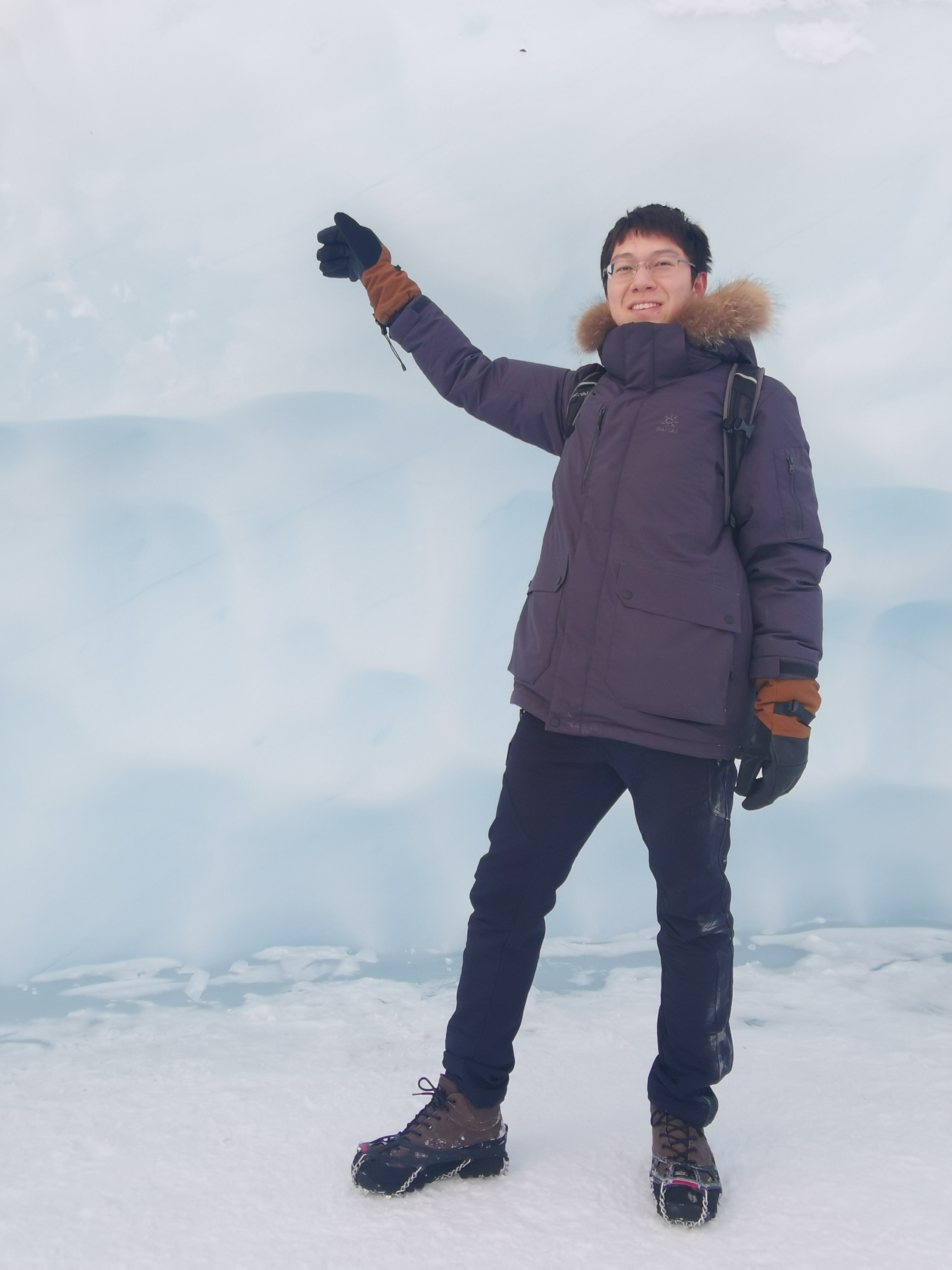 A photo of Sihao in a glacier